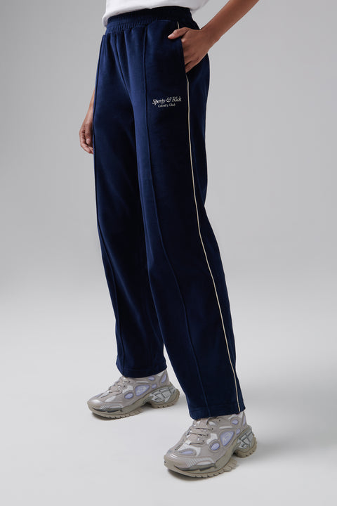 Sporty & Rich Blue Script Velour Track Pants
